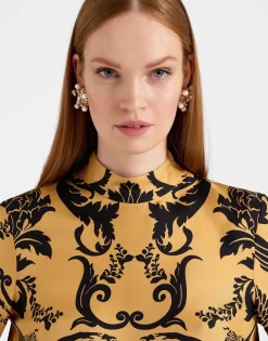 Make An Exit TopCherubs Gold in Silk Twill With Feathers
